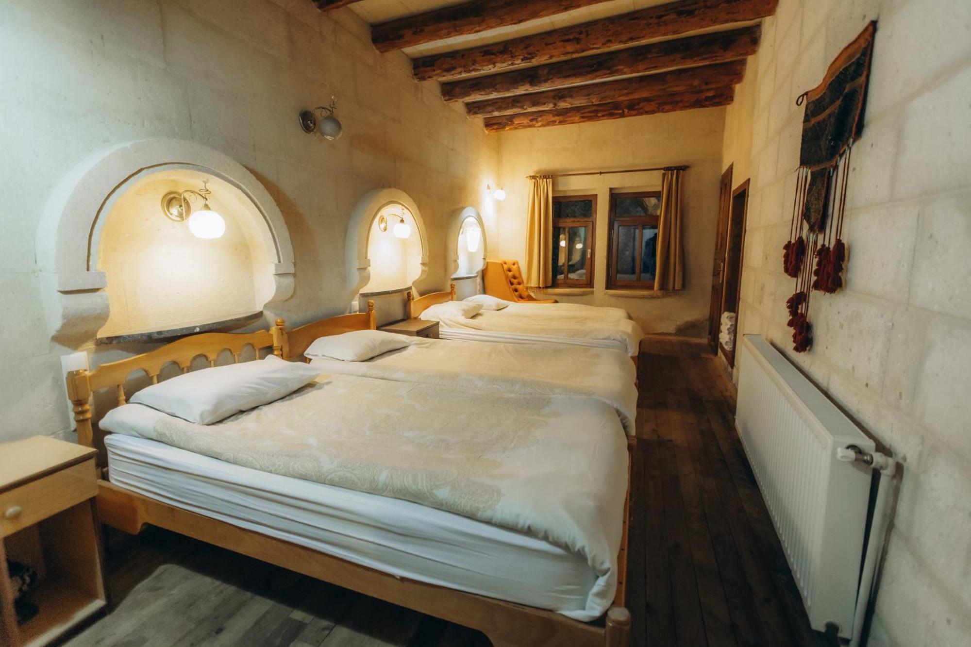 Anatolia Raymonde Cave House Hotel อุตชิซาร์ ภายนอก รูปภาพ