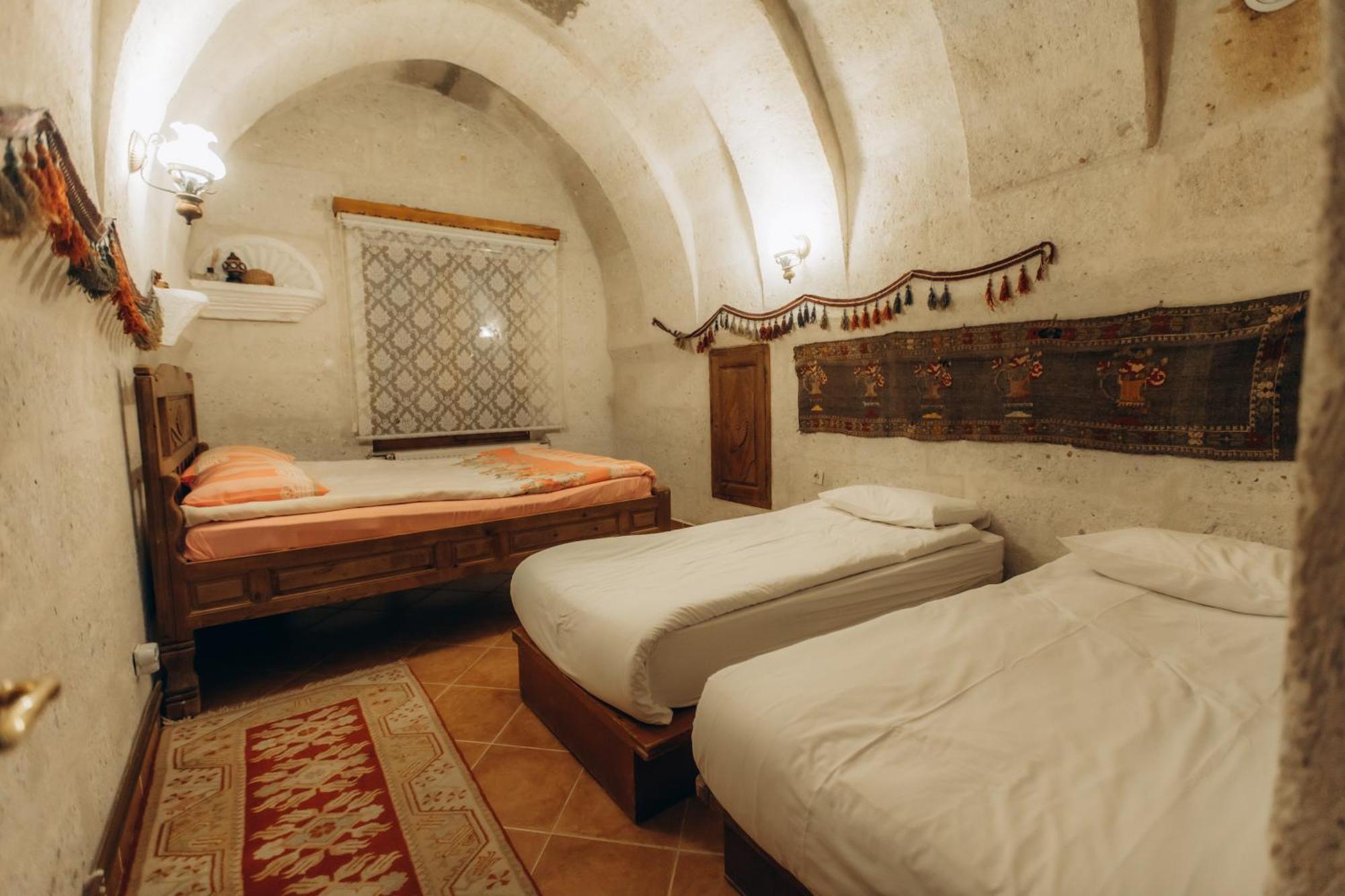 Anatolia Raymonde Cave House Hotel อุตชิซาร์ ภายนอก รูปภาพ
