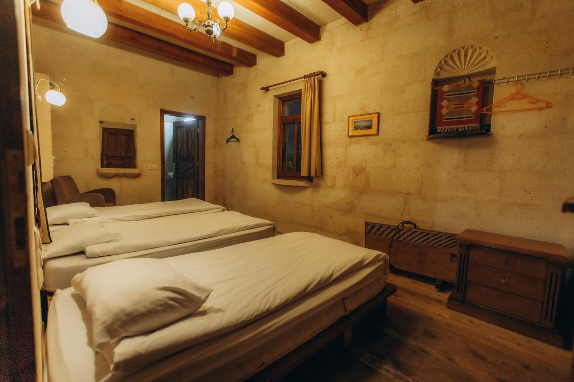Anatolia Raymonde Cave House Hotel อุตชิซาร์ ภายนอก รูปภาพ